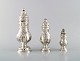 Set of three neo rococo sugar castors in silver (830S). Northern Europe, early 
20th century.