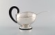 Franz Hingelberg, Denmark. Funkis sauce boat with sauce spoon in sterling 
silver. Danish design, 1936.