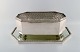 Pierard serving compote with removable grill on mirror plateau. Belgium, plated 
silver. 1930 / 40