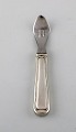 Rare Georg Jensen Old Danish can opener in sterling silver and stainless steel. 
