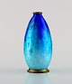 Alexandre Marty for Limoges, France. Art nouveau bronze vase in beautiful blue 
enamel work. Ca. 1910.
