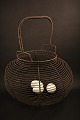 Large old French egg basket in fil de fer with a really fine patina.
H:40cm. Dia.:32cm.