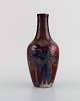 Karl Hansen Reistrup for Kähler. Antique vase in glazed ceramics. Beautiful 
luster glaze. 1890s.
