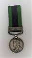 India General Service Medal 1908-1935, Waziristan 1919-21. Engraved on the edge 
28 SOWAR KHAZAN SINGH - 21 CAVY.
