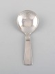 Just Andersen for Georg Jensen. Blok / Acadia jam spoon in sterling silver. 
Dated 1933-1944.
