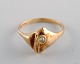 Scandinavian jeweler. Modernist ring in 14 carat gold adorned with brilliant. 
Mid-20th century.
