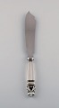 Georg Jensen Acorn cake knife in sterling silver and stainless steel.
