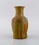 Patrick Nordström (1870-1929). Unique vase in glazed ceramics. Islev, own 
workshop. Beautiful glaze in light earth tones. Dated 1923.
