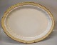 1559-788 Stort ovalt stegefad 47,5 x  36,5 cm Svejfet # 788 med beige kant og 
guld  
