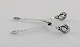 Georg Jensen Blossom sugar tong in sterling silver. Dated 1933-1944.
