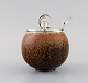 Saxbo lidded jar in glazed stoneware. Beautiful speckled glaze in light brown 
shades. 1940s.
