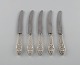Five rare and antique Georg Jensen Bell lunch knives in sterling silver and 
stainless steel. 1910