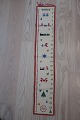 Christmas calendar
Beautiful. old, christmas calendar to hang up 
small parcels on, - one for each day in december, 
with rings to make it easy to hang up the parcels
Beautiful handmade
H: 90cm, B: 16cm
In good condition
The antique, Danish linen and f