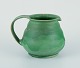 Kähler, Denmark. Ceramic pitcher.
Glaze in green tones.