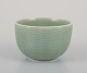 Axel Salto (1889-1961) for Royal Copenhagen. Keramikskål med riflet dekoration. 
Celadon glasur.