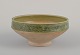 Nils Kähler for Kähler. Unique ceramic bowl. Unglazed and greenish glaze with a 
pattern.