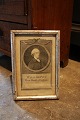K&Co. presents: 
Antique 
early 19th 
century 
engraving in 
silvered wooden 
frame…