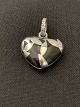 Heart pendant in silver.
Stamped 925S
Length with eaves. 2.3 cm