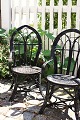 K&Co. presents: 
A pair of 
old French 
children's 
chairs in 
black-painted 
wicker with a 
really fine 
patina...
