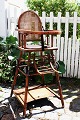 K&Co. presents: 
Old French 
children's high 
chair in wood 
from the 
30s/40s with 
French reeds...