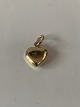 Beautiful and elegant gold heart in 14 carat gold. Stamped 585. Pendant for 
necklace or bracelet.