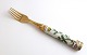 Royal Copenhagen. Flora Danica. Dinner fork with gilded silver from Michelsen 
(925). Length 19.8 cm.