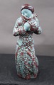 Michael Andersen Danish ceramics, Bornholm, in the series seasons. Young girl with muff, or winter