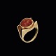 Einer Fehrn. 
Ring i 14k guld 
med rav.