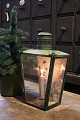 K&Co. presents: 
Nice, old 
lantern in 
metal with 
glass on 3 
sides and green 
color 
with a really 
nice patina...
