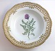 Royal Copenhagen. Flora danica. Dyb Tallerken med gennembrudt kant. Diameter 
24,5 cm. Model 3547. ( 1 sortering ). Astragalus danicus Retz