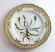 Royal Copenhagen, Flora Danica. Frokost tallerken med gennemskåret bort. Design 
#3554. Diameter 23 cm. (1 sortering). Taraxacum palustre