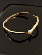14 karat guld armring med gte perle