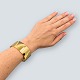 Frantz 
Hingelberg; 
Bred armring i 
14 kt. guld