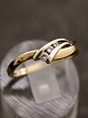 14 karat guld ring med klare stene