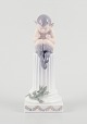Royal 
Copenhagen, 
figur af 
porcelæn.
Fløjtende Pan 
...