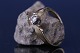 Antik Huset 
præsenterer: 
Damering i 
9 karat rød- og 
hvidguld, med 
diamant. 
Stemplet T.A.D, 
375, størrelse 
55.