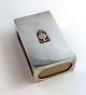 Georg Jensen. Large silver match holder with king