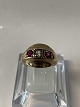 8 carat gold, Ladies ring with 2 red and 1 clear stone.
Ring size 52.