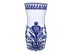 Antik K 
presents: 
Blue 
Flower
Rare and tall 
vase with 
unusual 
decoration
