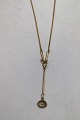 Danam Antik 
præsenterer: 
Georg 
Jensen 18K Guld 
Vedhæng og Kæde 
No. 1506A 
Savannah Torun 
(Røg Quartz)