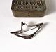 Henning Koppel 
for Georg 
Jensen broche i 
sterlingsølv 
...
