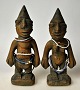 Pair of wooden 
figures, man 
and woman, 20th 
century. ...