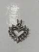 Pendant 14 carat white gold, shaped like a, Heart
with inlaid Diamonds.