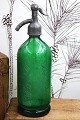 K&Co. presents: 
Decorative 
old French 
glass siphon 
green color 
from old 
café...
