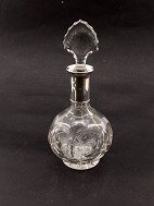 Crystal decanter with silver mounting