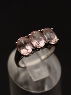 9 carat white gold ring with 3 light pink stones