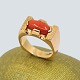 Antik 
Damgaard-
Lauritsen 
presents: 
Ring in 
14k gold, set 
with a coral
