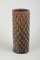 L'Art præsenterer: Axel Salto for Royal Copenhagen.Tidlig vase, 1930’erne.Cylindrisk stentøjsvase i ...