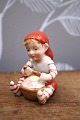 K&Co. presents: Royal Copenhagen Pixie pixie in porcelain, no.760. Elf boy with porridge.