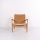 Osted Antik & Design præsenterer: CH25 Lænestol i Patineret Massiv Eg og Flet af Hans J. Wegner